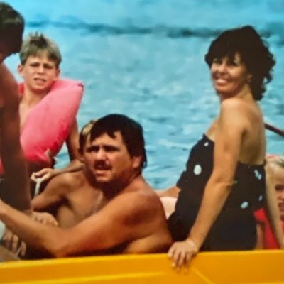 Family cruising on clear water